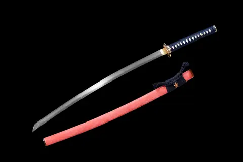 Katana Hinode en acier damas, hamon croisé, saya en galuchat rouge